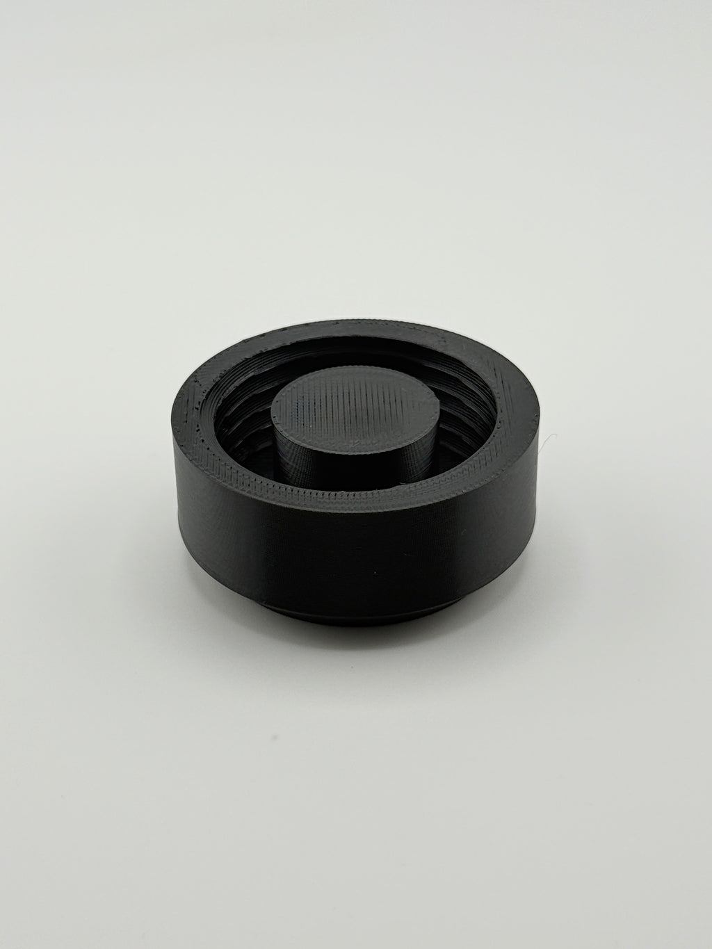 TrackMount main cap that threads on and clamps the holder to a 7/8 inch cane shaft