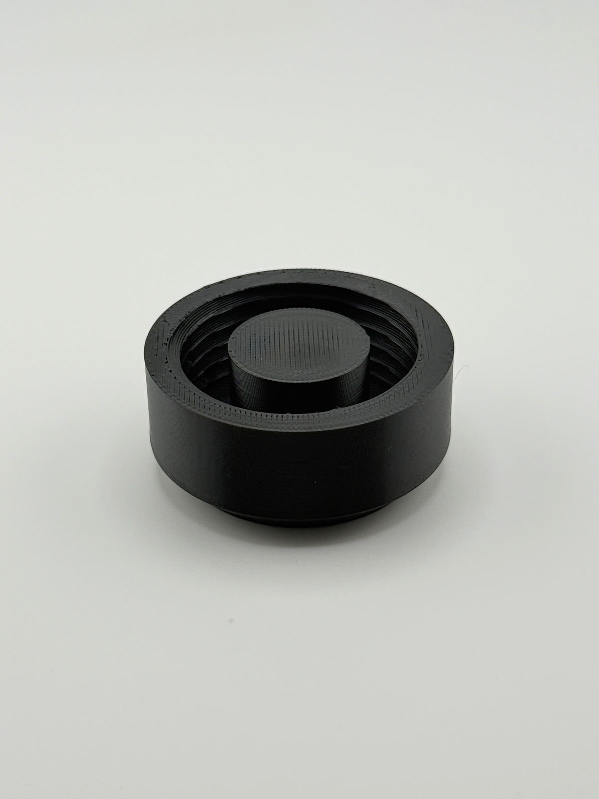 TrackMount main cap that threads on and clamps the holder to a 7/8 inch cane shaft