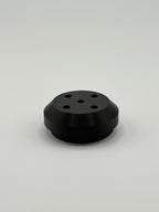 TrackMount perforated cap with five holes that let an AirTag chime ring through