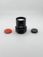 AirTag seated inside the TrackMount tracker compartment with Moto Tag and Tile Sticker alongside