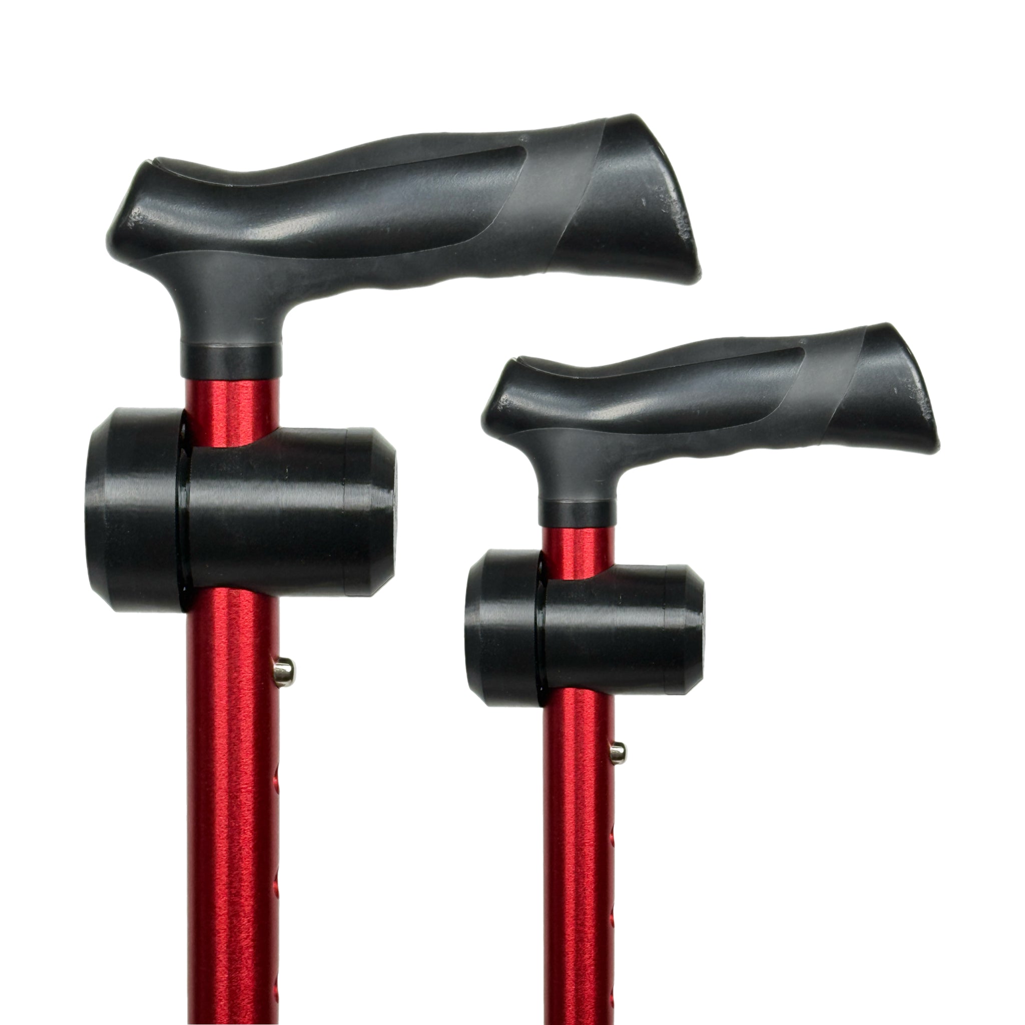 Two black TrackMount tracker holders mounted on red aluminum walking canes, shown against a white background