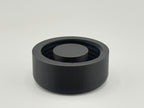 Single black TrackMount main cap shown from above, with internal threads and the central stop rib that grips the cane