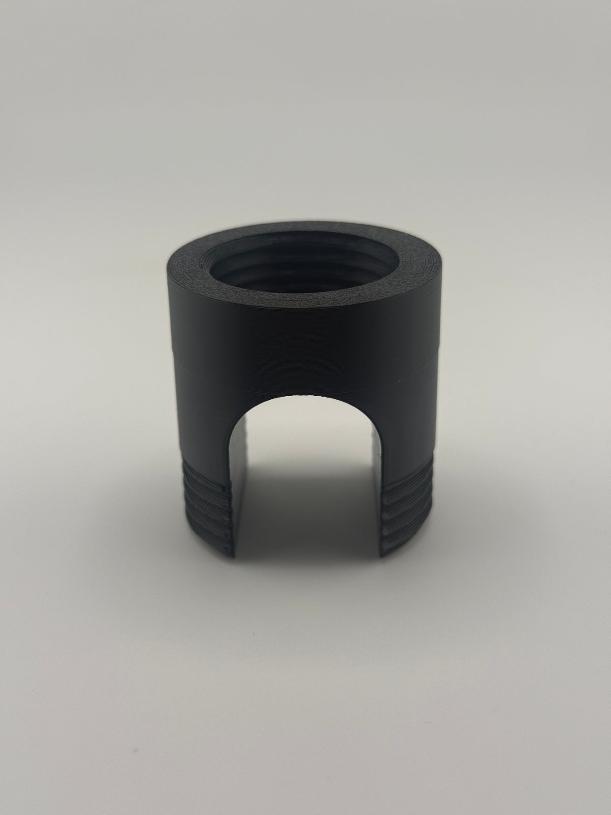 TrackMount XL main body, the threaded black holder that clamps onto the cane shaft